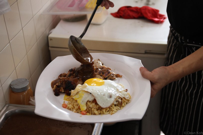 The first dish of the day: Chicken chop with fried rice and double eggs
