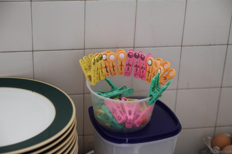 Humble clothes pegs to mark dishes to prepare during the lunch rush hour...